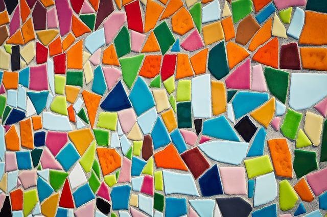 Photo of coloured mosaic tiles – to symbolize the difference between proofreading and copyediting